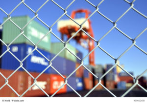 container yard behind security fence